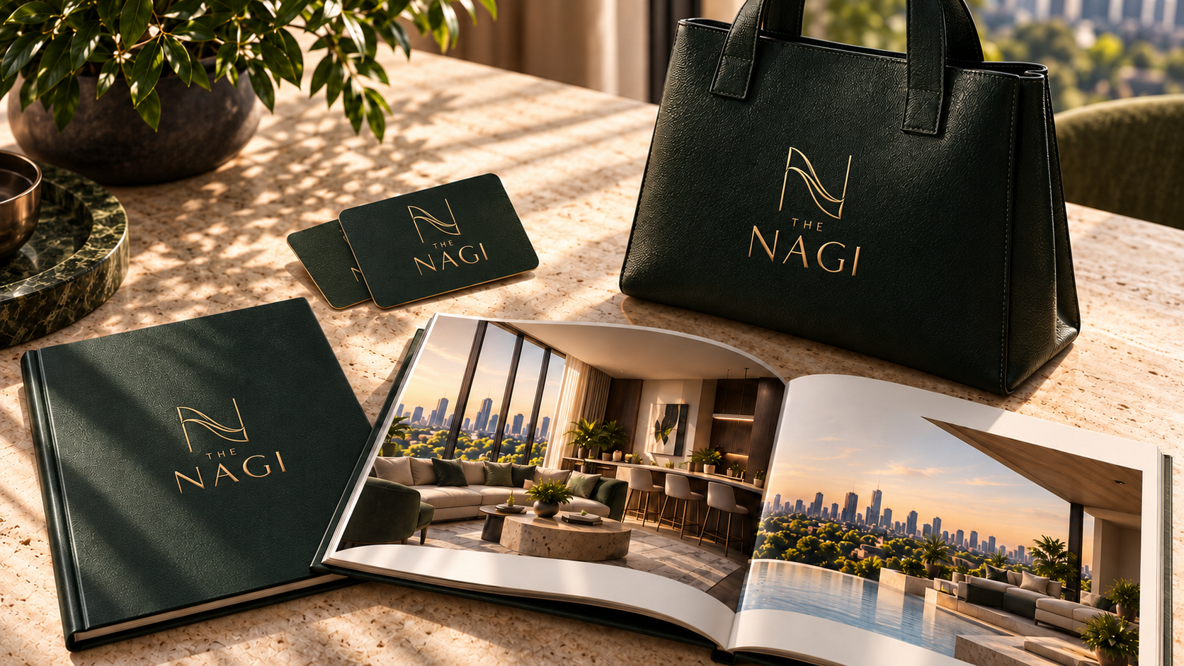 The Nagi branded resident cards, bag, and leasing brochure in a photographic concept mockup